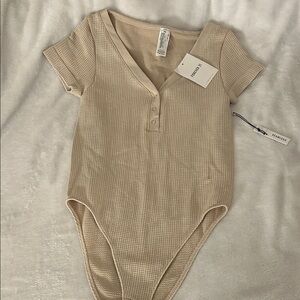 Beige women’s One Piece Bodysuit